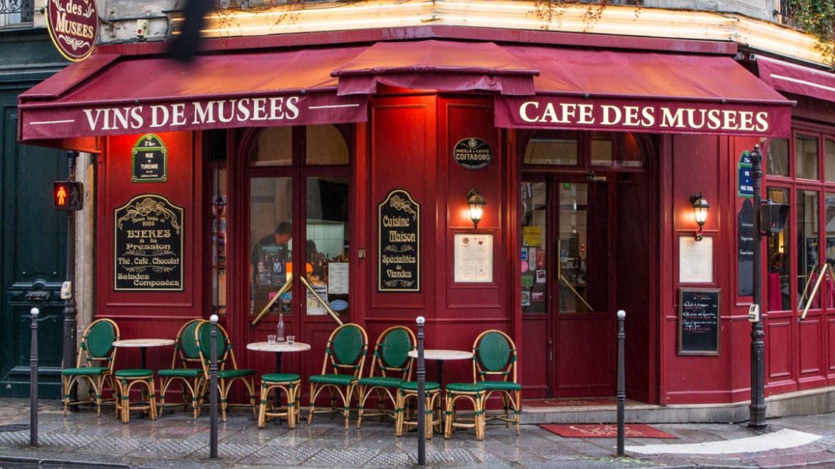 cafe-musees-facade-diolez-1170x780 a tall tower in a city