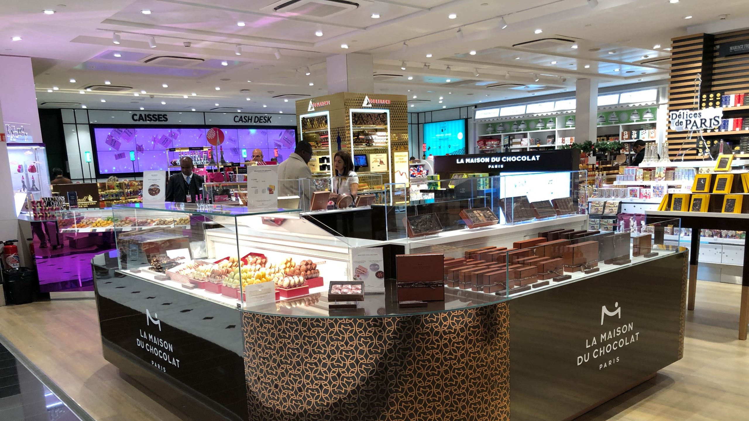 maison du chocolat a bridge that has a statue on top of it